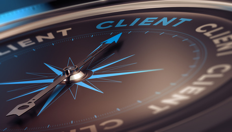 Compass with needle pointing the word client, concept image to illustrate CRM, customer relationship management.
